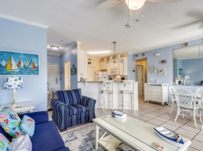 SPC 4133 Beautiful Tennis Court 2 bedroom with free beach set up for 2 by RedAwning