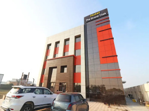 Capital O 19916 The Grand Tilak