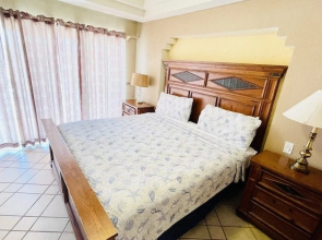 Spectacular 2 Bedroom Condo on Sandy Beach at Las Palmas Resort B-104 2 Condo by RedAwning