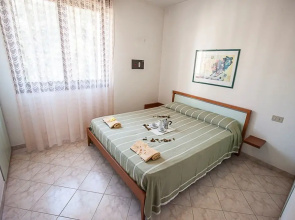 Seaside Happiness Flat and Shared Pool in Rosolina