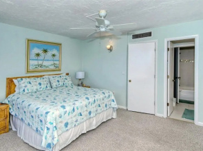 LaPlaya 201C Breathtaking Gulf panorama from this corner end unit with a private stairway to the beach