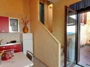 Apartment in Cannegione with communal terrace