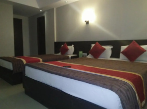 GreenWood Inn & Suites