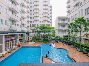 Homey and Modern Look 2BR Bogor Icon Apartment By Travelio