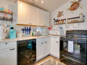 Furnished Deck: Waterfront Port Isabel Cottage!