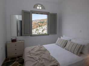 By The Stone Tinos