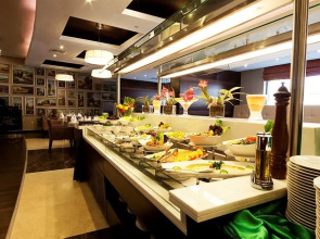 Отель Grand Belle Vue 