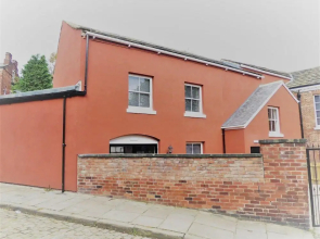 Studio at The Coach House Apartments