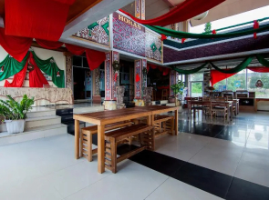 Thyesza Hotel by OYO Rooms