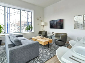 Bright Designer Loft Steps From Path to NYC