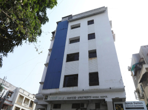 OYO 890 Seven Suites Apartment