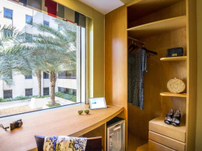 Отель Ibis Mall Avenue Dubai