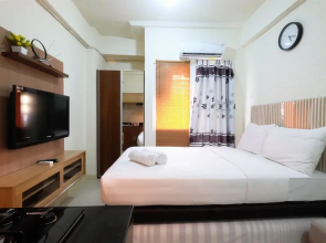 Studio Room at Green Pramuka City Apartment with Mall Access By Travel