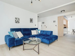 Wroclaw Dark Blue Apartment by Renters