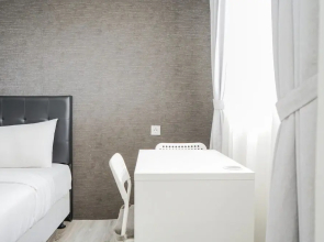 Compact and Monochrome Studio Room Bintaro Icon Apartment