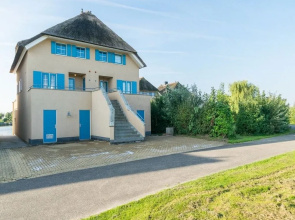 Exclusive Holiday Home Floating on a Lake in Friesland