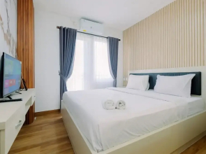 Restful and Modern 2BR at Sentul Tower Apartment