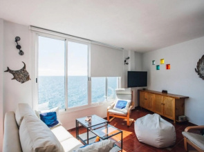 Canary casita next to the Atlantic Ocean