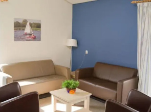Chalet in Bergumermeer by the Canal