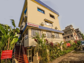 Guru Laxmi Apartments by OYO Rooms
