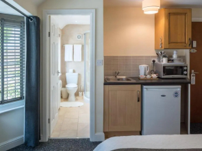 Holcombe House Aparthotel