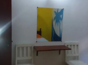 Malika's Yellow House