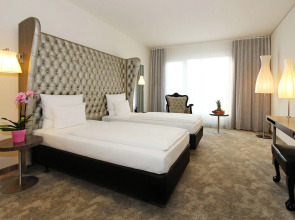 Отель Arcotel John F 