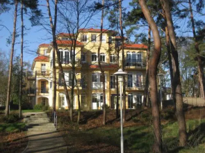 Kurparkresidenz Baabe - Ferienwohnung Meeresgarten mit Terrasse