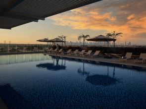 Отель Mövenpick Jumeirah Village Triangle