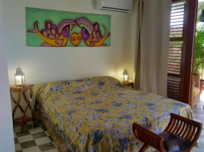 Studio Frangipani dans Villa Fleurs des Iles