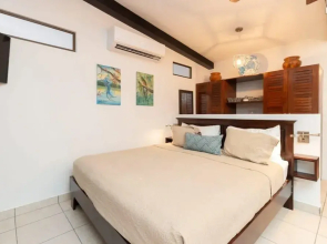 Modern Studio Apartment with Covered Balcony, Full Kitchen, and Stunning Ocean Views