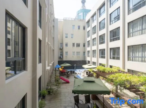 Maison New Century Hotel