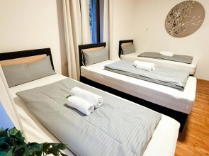 Suiteable Living - Boardinghaus mit Parkplätzen, WLAN und Waschraum