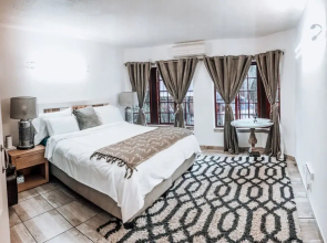Serene Thatched Roof Retreat in Faerie Glen, Pretoria