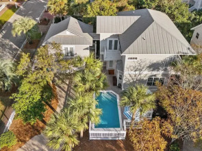 Steps to Beach! Arcade Game Room, Pool + Hot Tub Calico Scallop by Avantstay