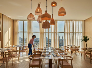 Отель Mövenpick Jumeirah Village Triangle