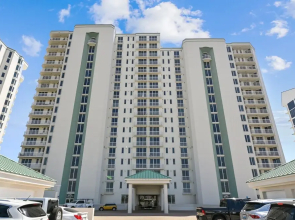 Silver Beach 506 is a gorgeous Gulf Front 4 BR with free beach service - sleeps 8 by RedAwning