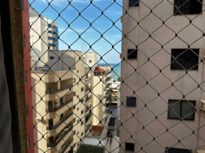 NAP001 - APTO Amplo com 3 Quartos sendo 1 Suíte, Sacada Grande com Churrasqueira, Garagem, Tela de Proteção e Internet