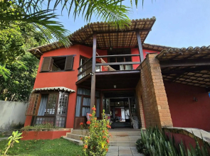 Casa Toscana 4 suítes, piscina e churrasqueira