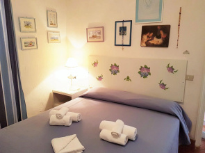 Attractive Holiday Home in Marinella with Balcony