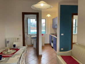 Snug holiday home in Loano with shared pool