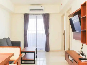 Homey and Comfortable 3BR at Meikarta Apartment By Travelio