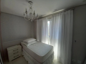 Apto novo, 2 quartos, quadra praia em Santos.