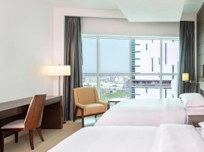 Отель Four Points by Sheraton Sharjah