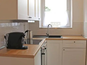 Moderne 1-Zimmer Wohnung mit Terasse, Küche, Bad mit Dusche, TV & WIFI