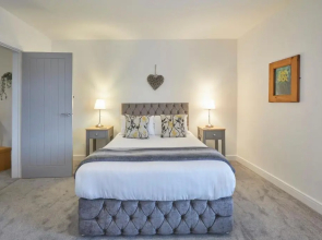 Host Stay Louisa Cottage