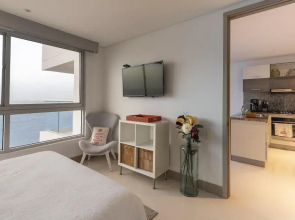 Relaxing 1 BR Beachfront Apartment w Wifi and Pool