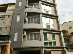 Q House