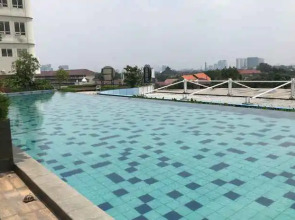 Tidy and Comfort 2BR at Cinere Bellevue Suites Apartment By Travelio