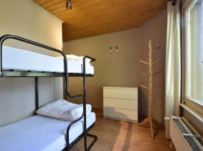 Nestled In A Green Scenery, This Chalet Along The River Is Perfect To Chill Out!